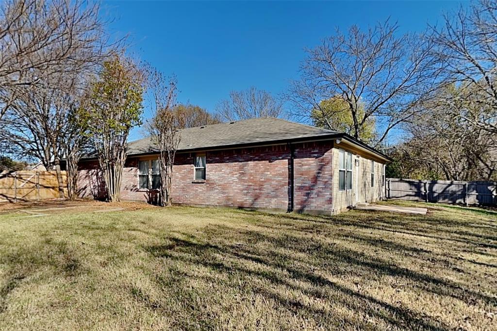 1200 Rambling Brook Trail Denton, TX 76210 - Photo 20 of 21 a view of a house with a yard