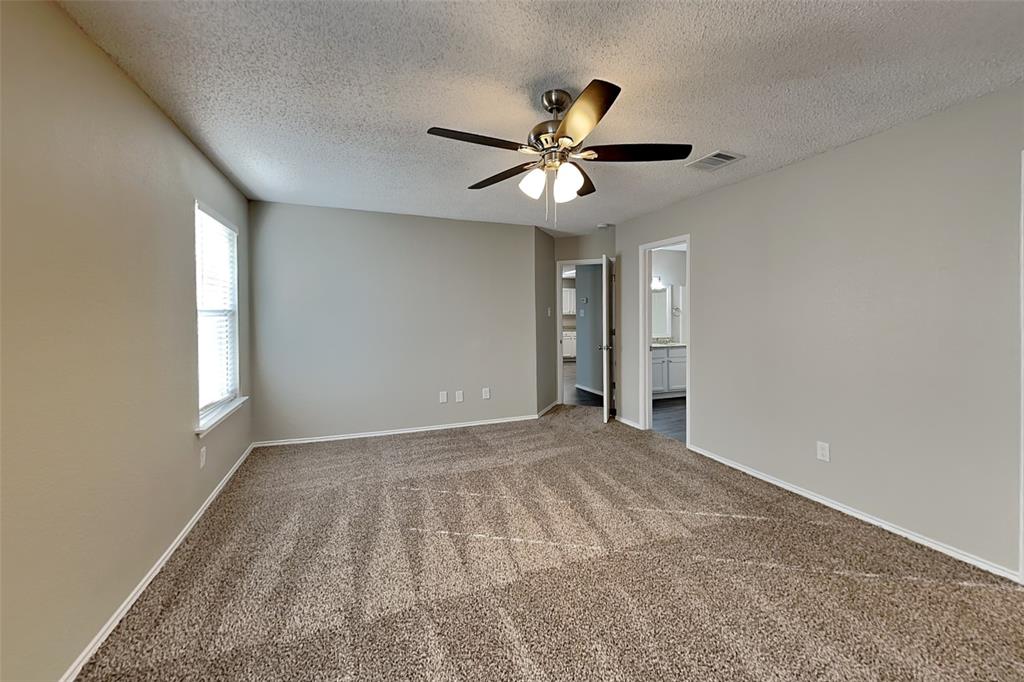 1200 Rambling Brook Trail Denton, TX 76210 - Photo 9 of 21 a view of an empty room with a window