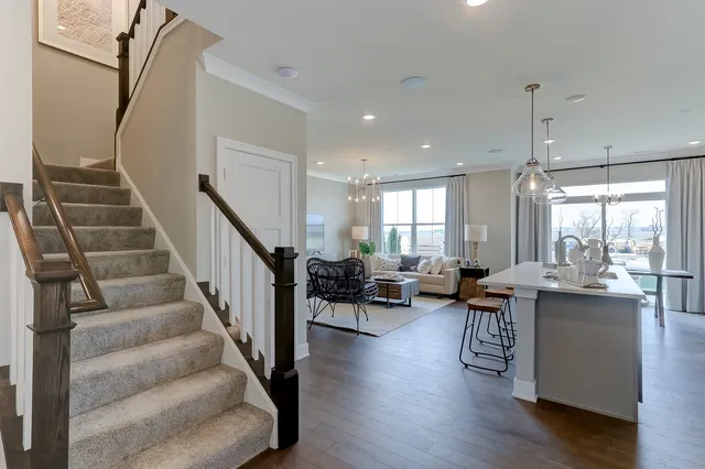 a view of entryway and livingroom with wooden floor