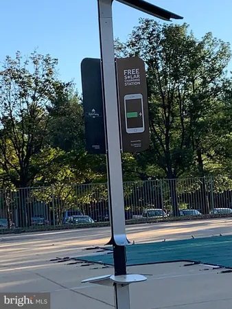a sign board with parking space