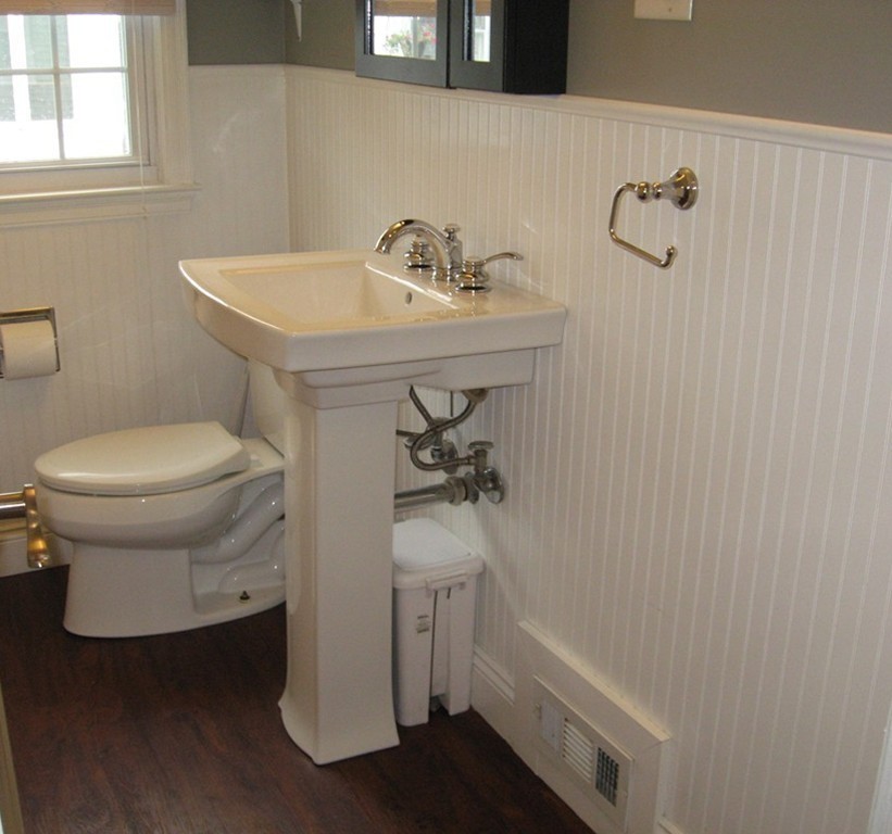 59 Mayflower Road Springfield, MA 01118 - Photo 19 of 27 a bathroom with a sink a toilet and shower