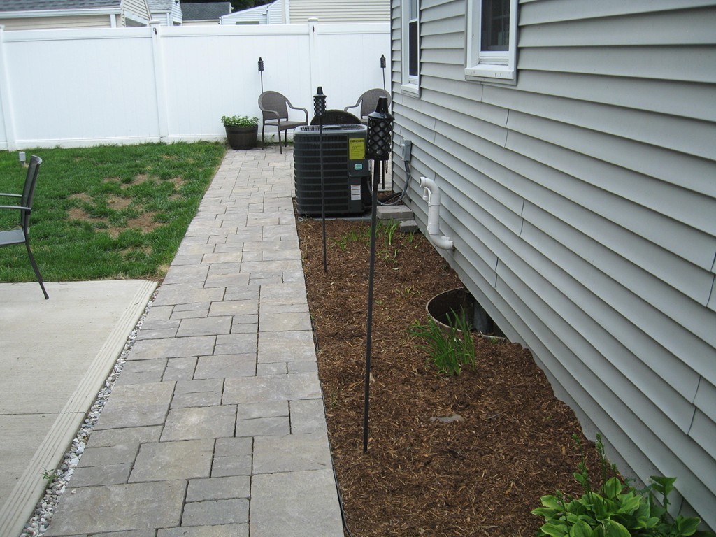59 Mayflower Road Springfield, MA 01118 - Photo 22 of 27 a view of a pathway with a backyard