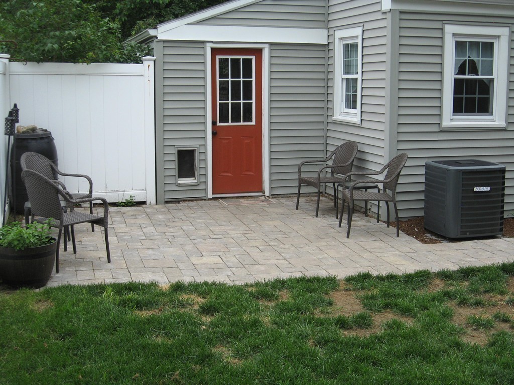 59 Mayflower Road Springfield, MA 01118 - Photo 23 of 27 a backyard of a house with seating space