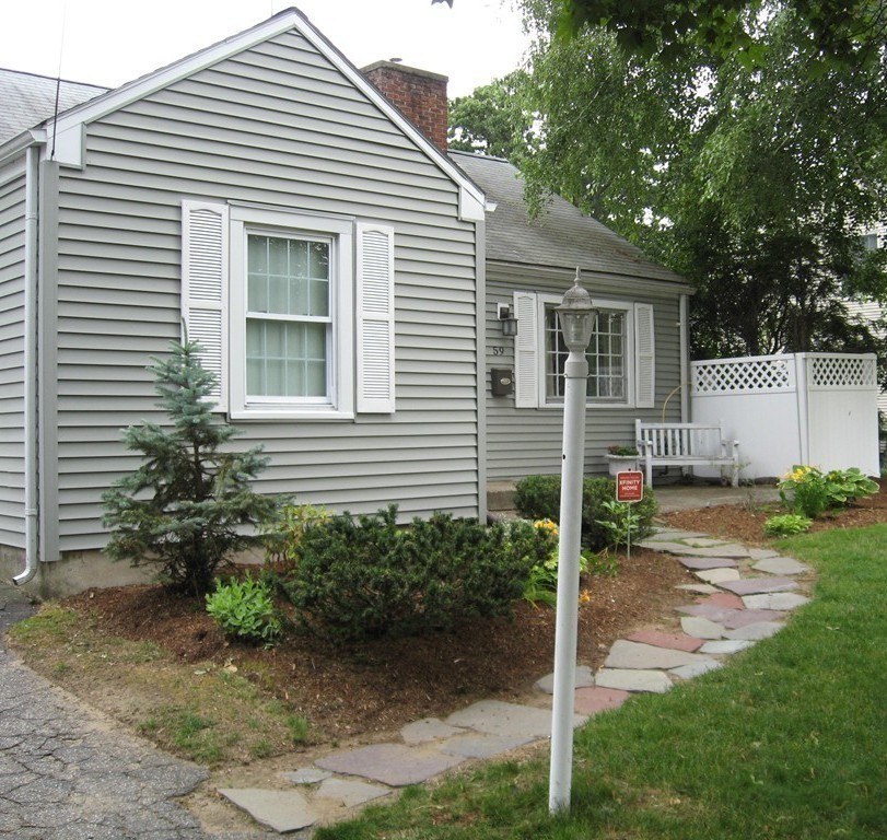 59 Mayflower Road Springfield, MA 01118 - Photo 3 of 27 a view of a house with backyard