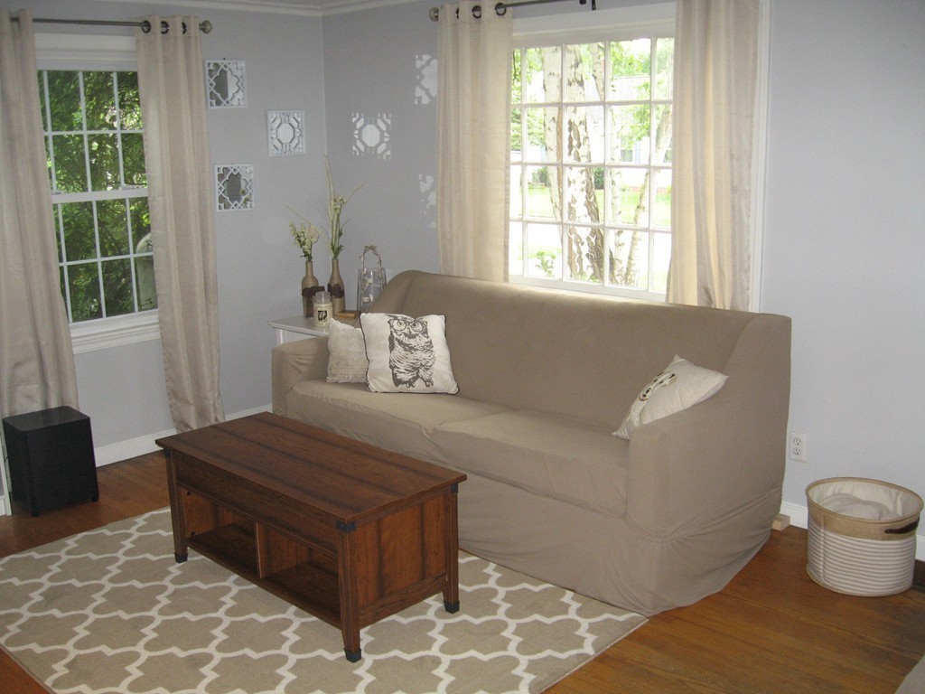 59 Mayflower Road Springfield, MA 01118 - Photo 5 of 27 a living room with furniture and a window