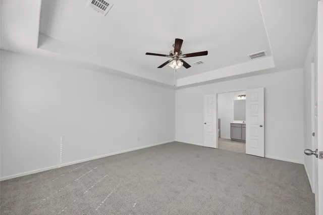 a view of a big room with carpet