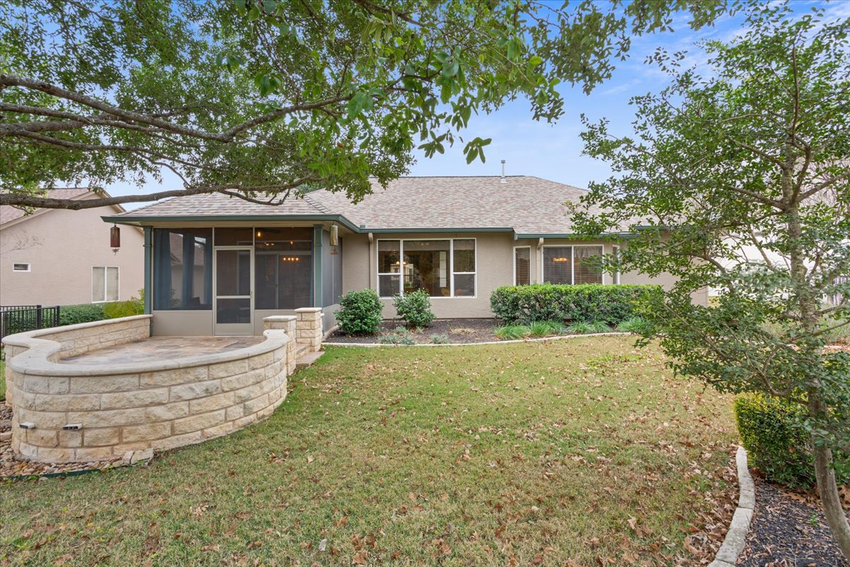 246 Red Poppy Trail Georgetown, TX 78633 - Photo 1 of 32 a front view of house with yard and green space