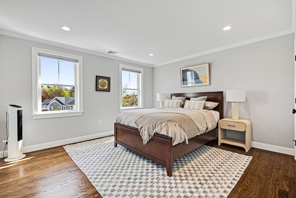 17 Sunrise Terrace Needham, MA 02492 - Photo 22 of 42 a bedroom with a large bed and a window