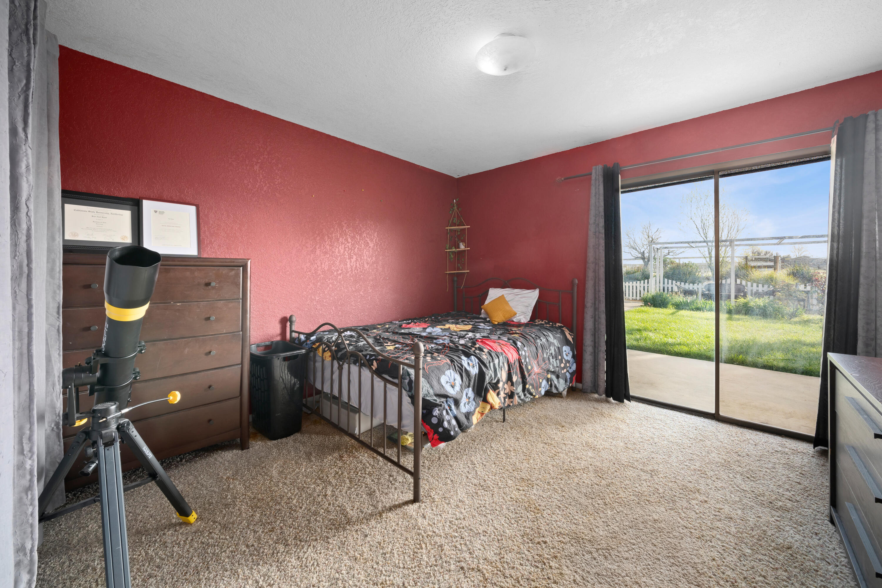 7595 Feenstra Road Paso Robles, CA 93446 - Photo 18 of 43 a bedroom with a bed and large window