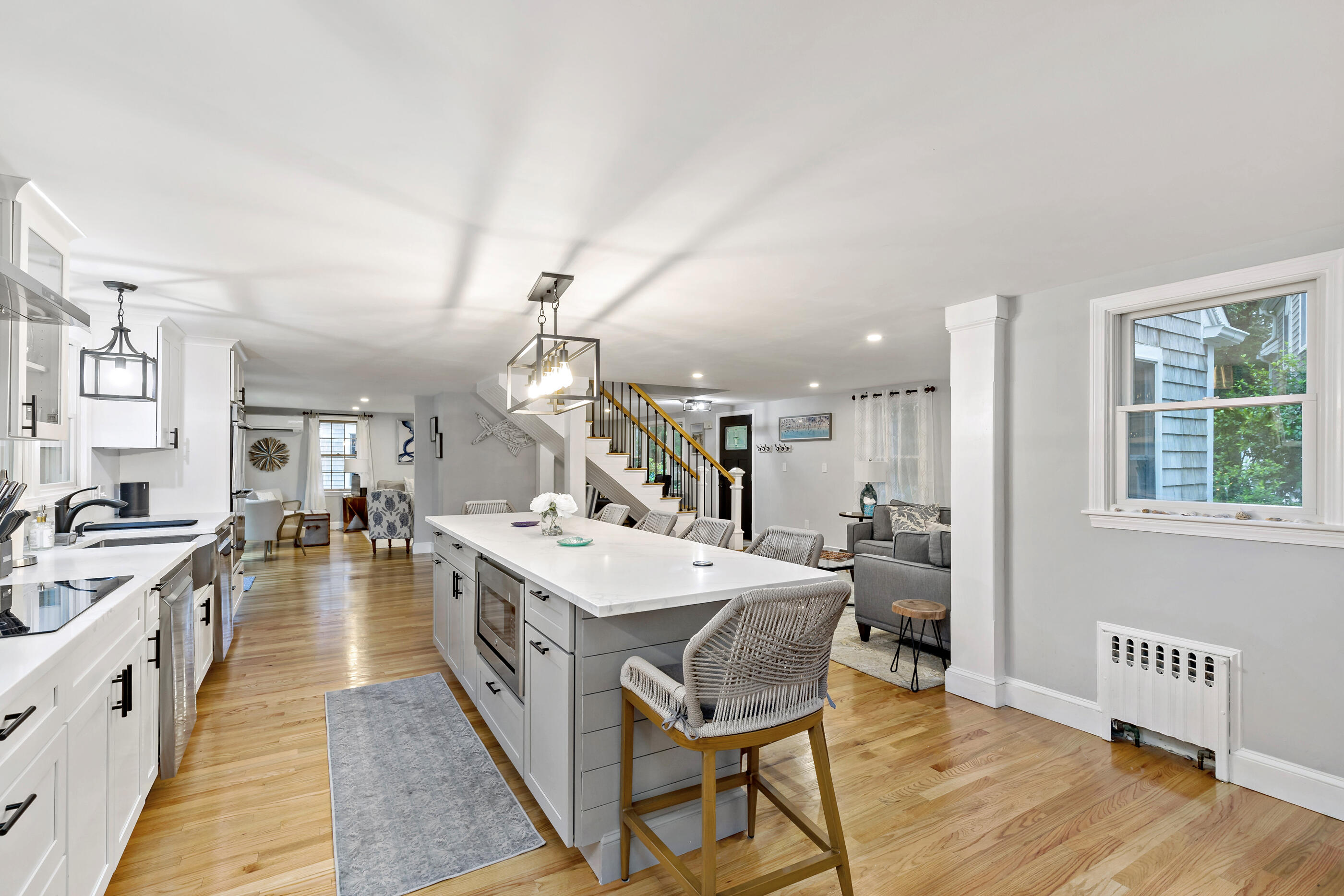 414 Eel River Road Osterville, MA 02655 - Photo 11 of 40 a large kitchen with a table and chairs