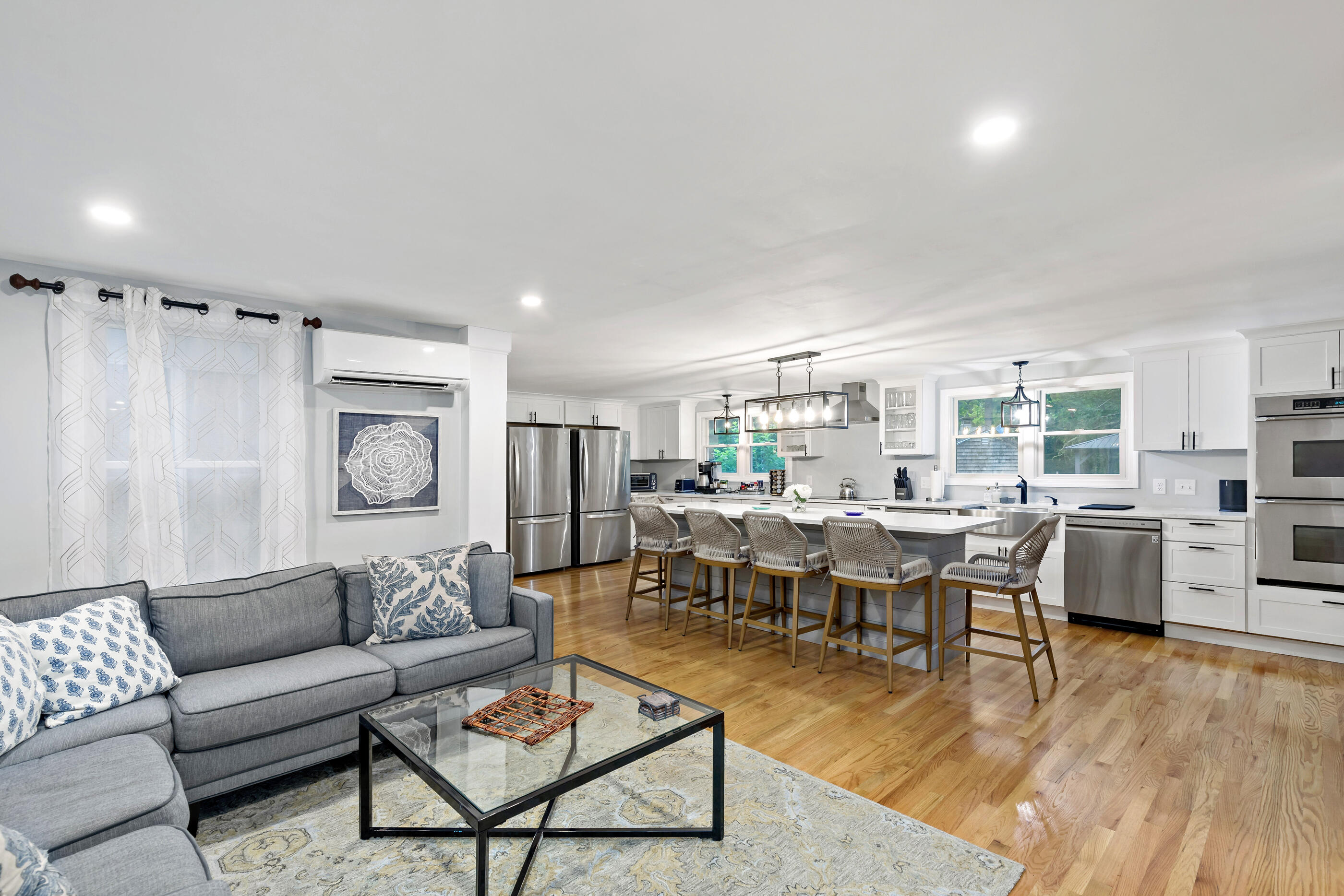 414 Eel River Road Osterville, MA 02655 - Photo 15 of 40 a living room with lots of furniture and view of kitchen