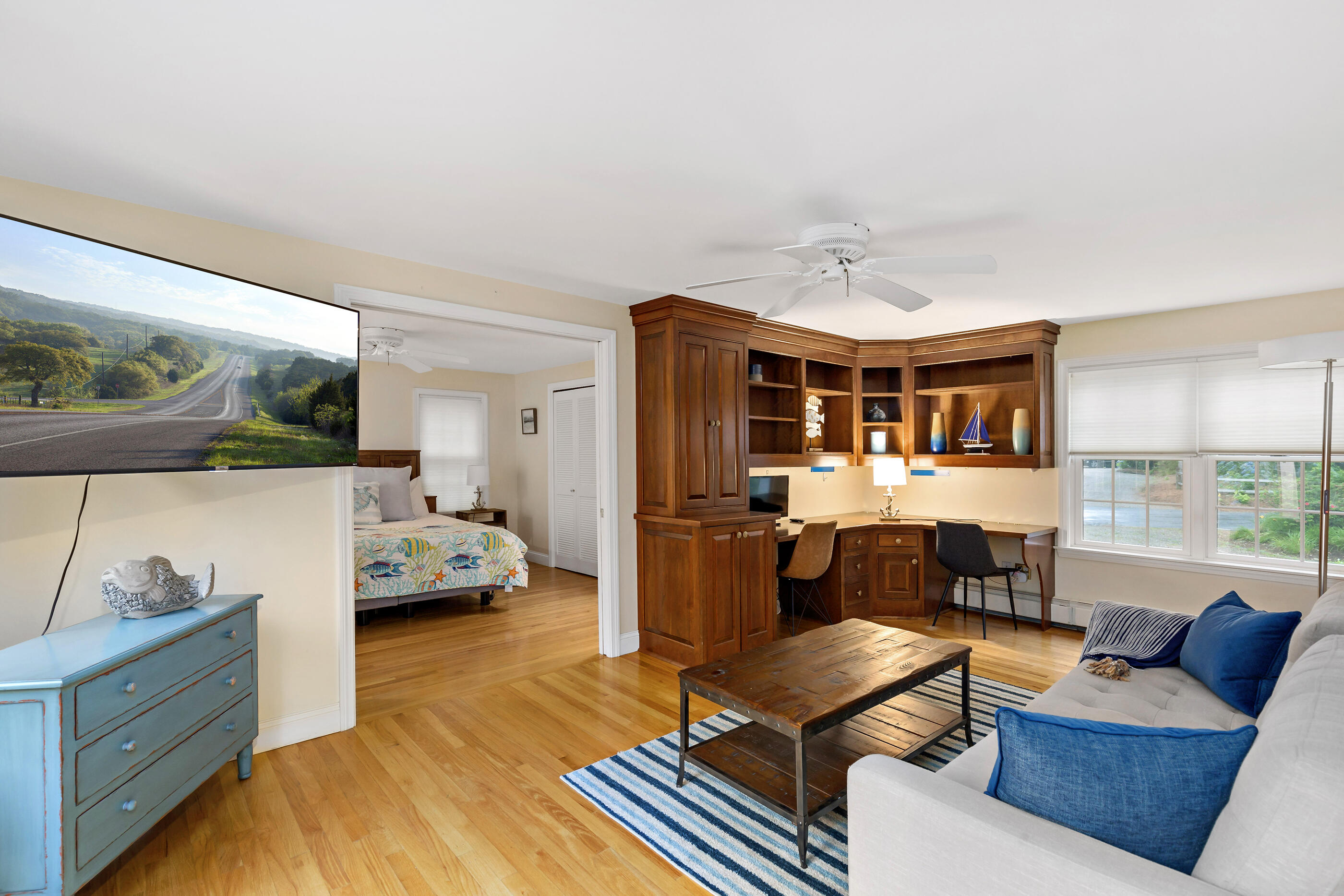 414 Eel River Road Osterville, MA 02655 - Photo 23 of 40 a living room with furniture and a large window