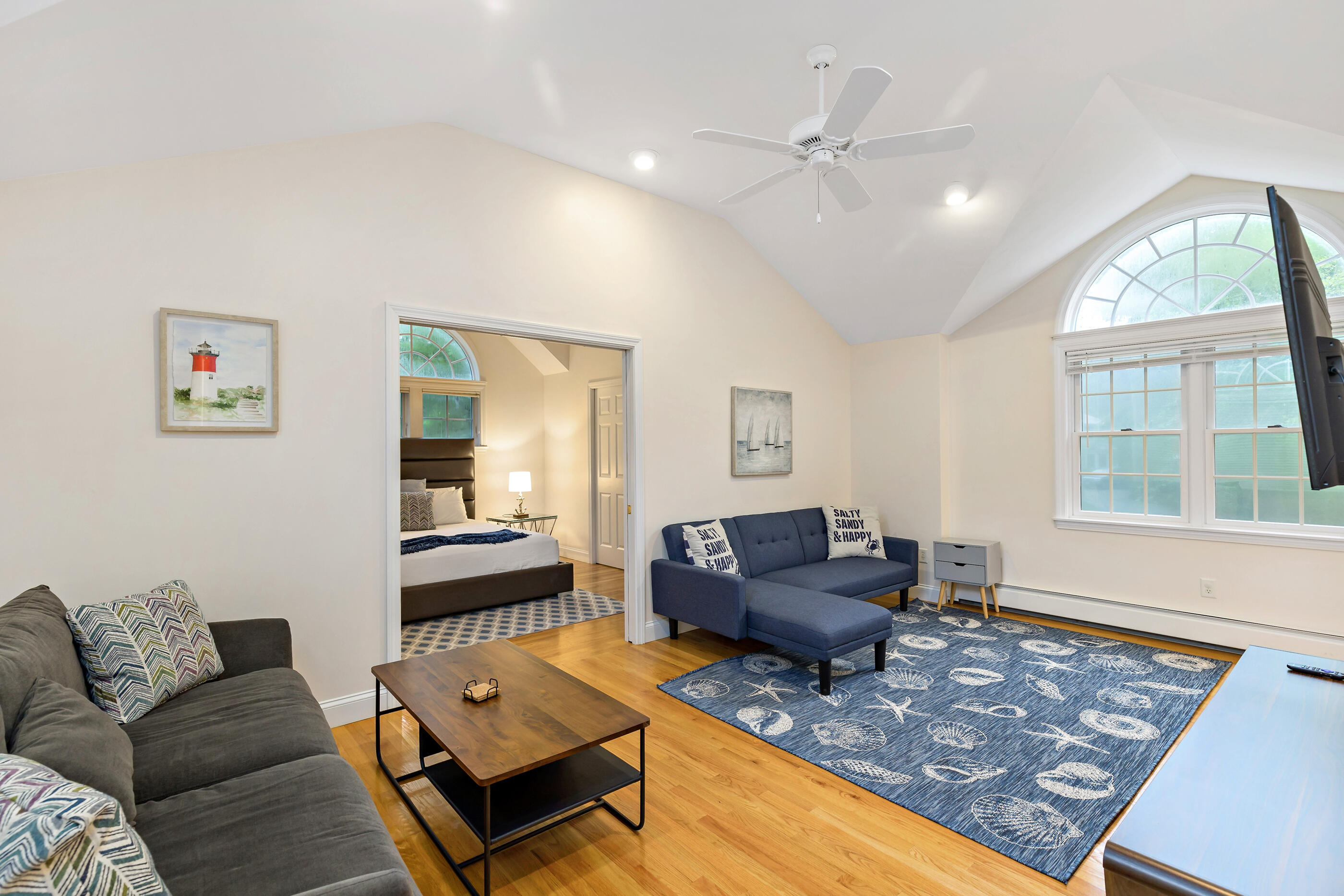 414 Eel River Road Osterville, MA 02655 - Photo 26 of 40 a living room with furniture and a large window