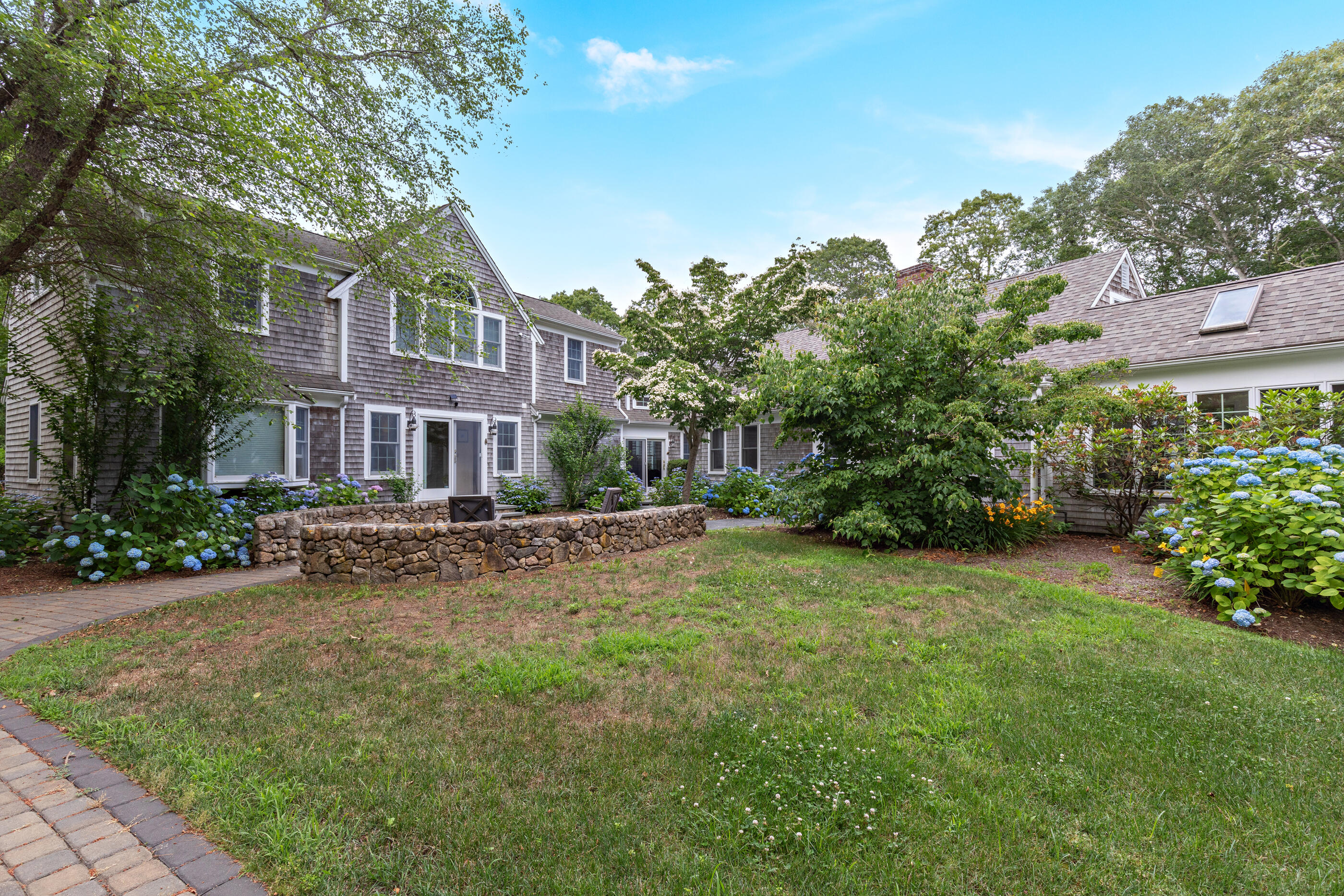 414 Eel River Road Osterville, MA 02655 - Photo 3 of 40 a view of a house with a yard