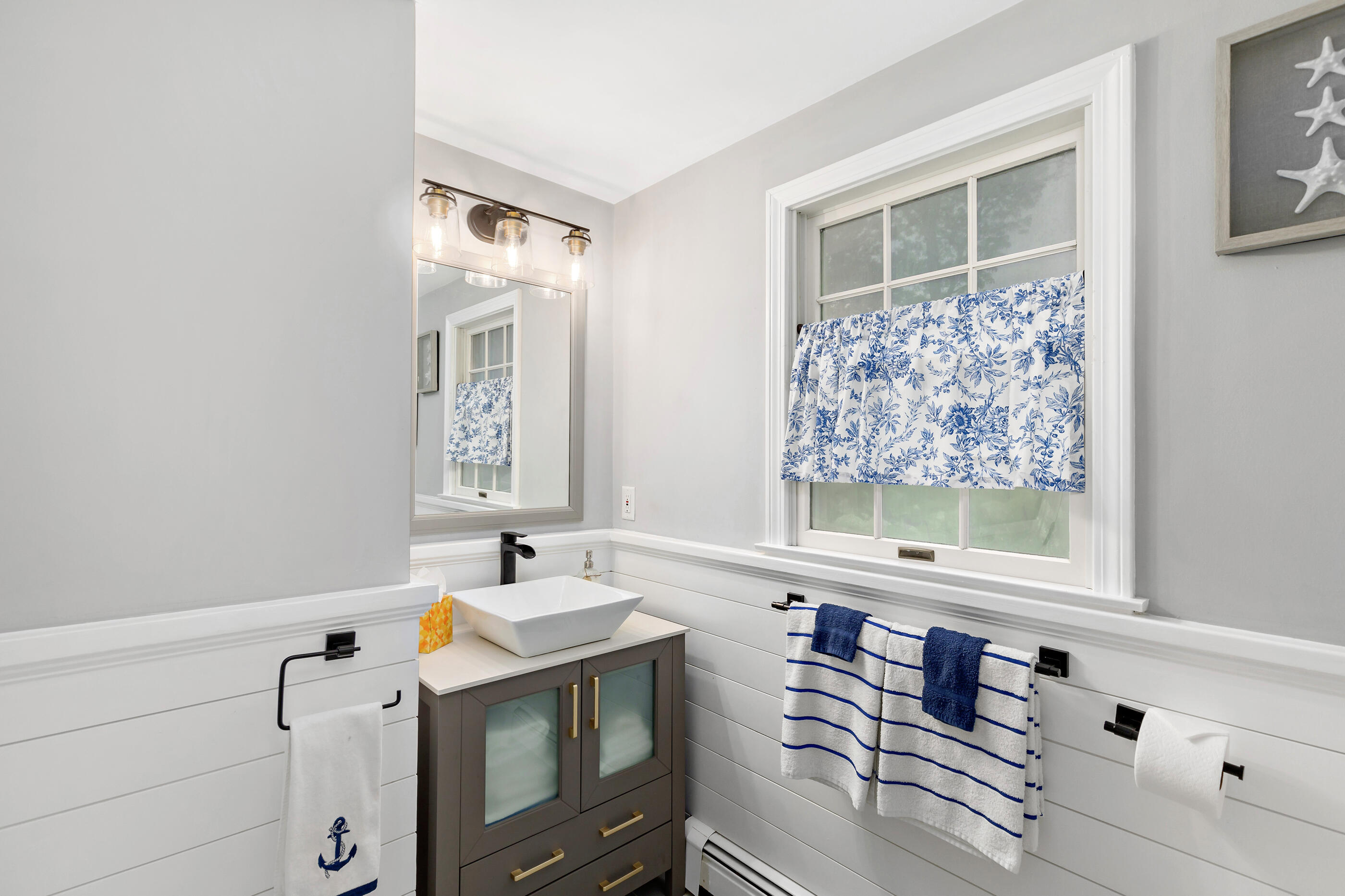 414 Eel River Road Osterville, MA 02655 - Photo 34 of 40 a bathroom with a sink and a window