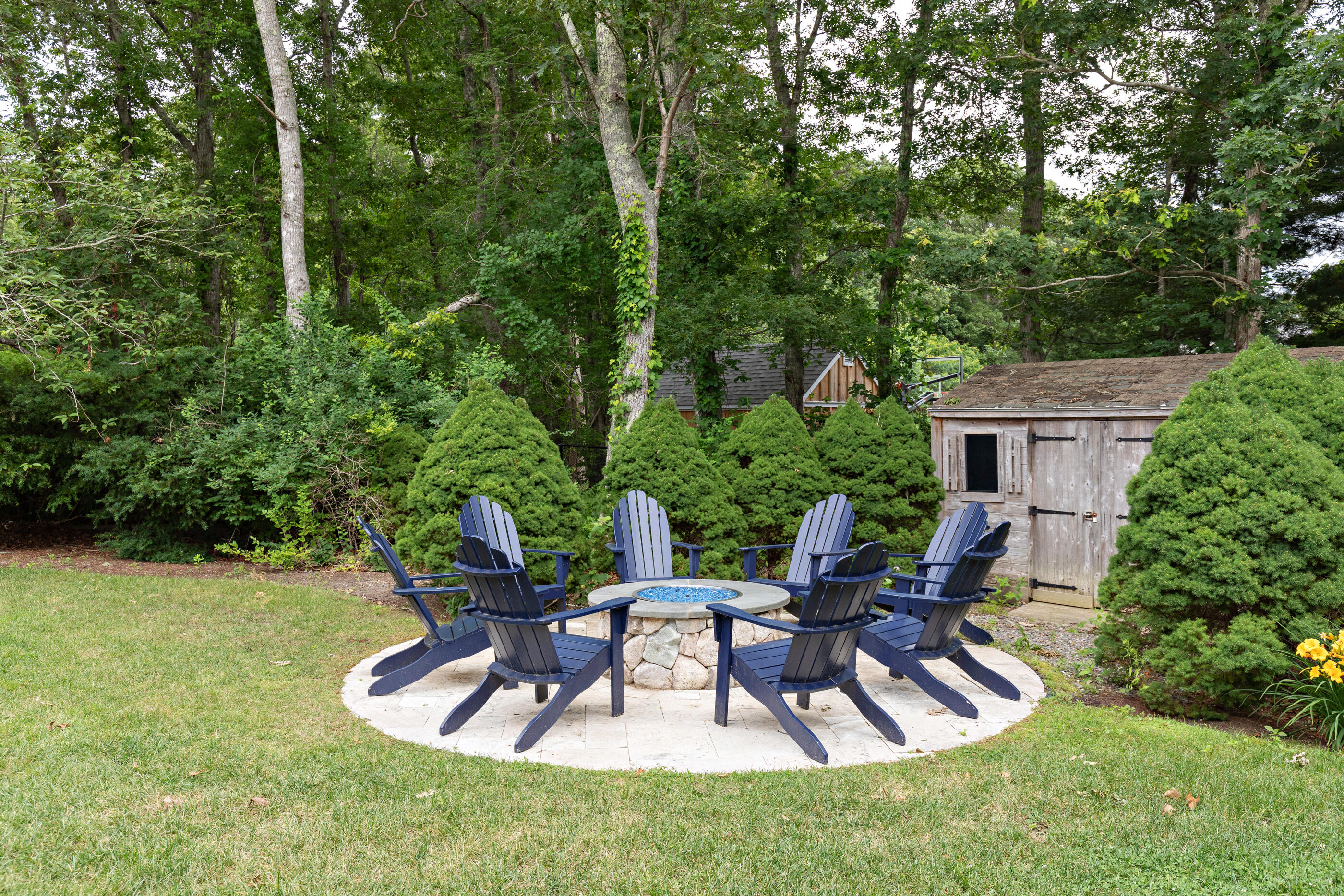 414 Eel River Road Osterville, MA 02655 - Photo 8 of 40 a view of a chairs and table in patio