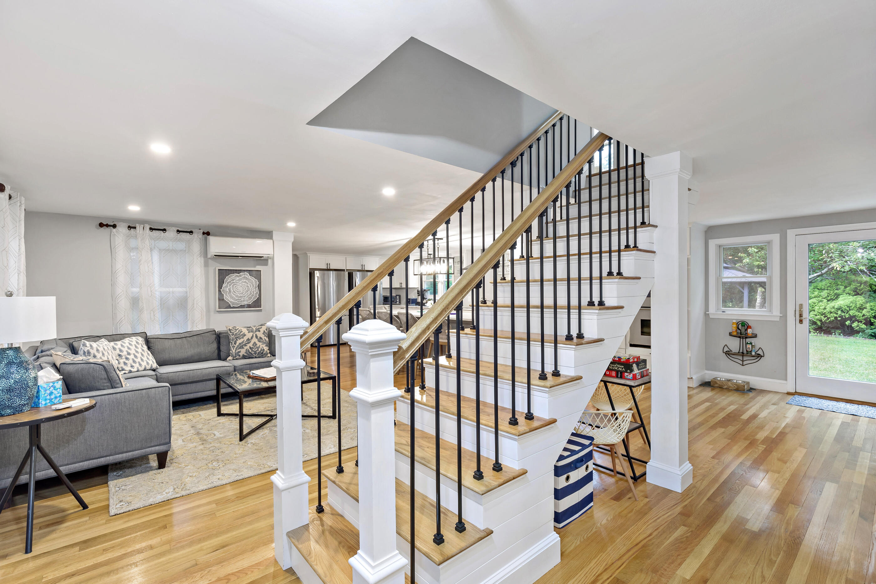 414 Eel River Road Osterville, MA 02655 - Photo 10 of 40 a view of entryway livingroom and hall with wooden floor
