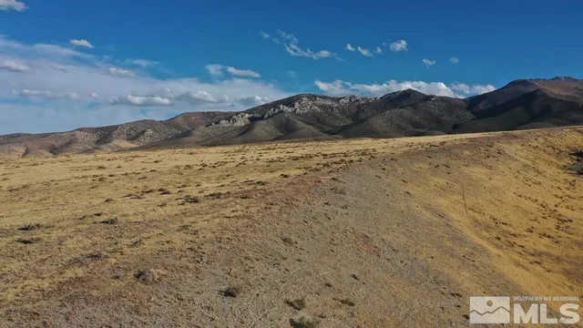 a view of ocean with a beach