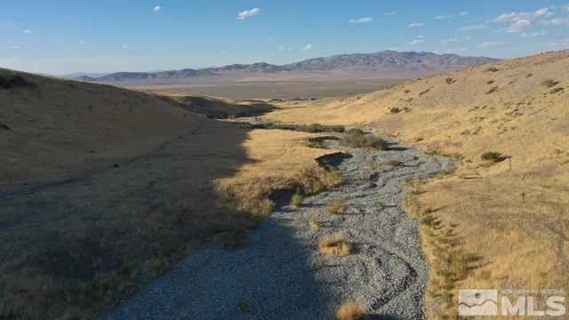 a view of lake and mountain