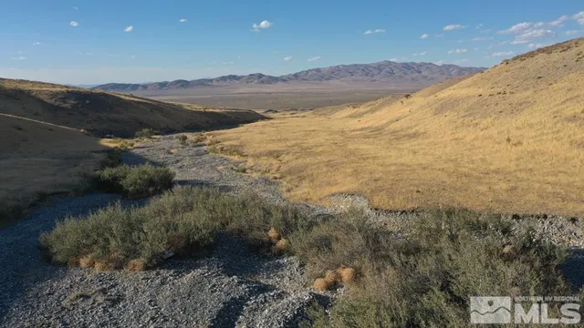 a view of ocean and mountain