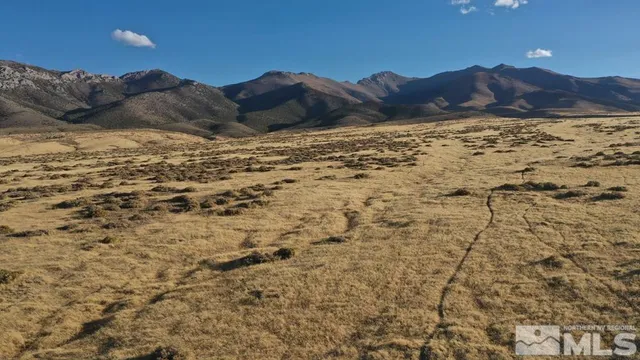 a view of ocean and mountain