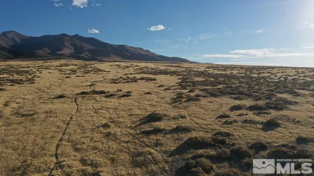 a view of ocean and mountain