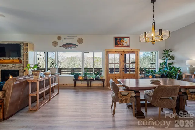 a kitchen with a sink stove top oven and cabinets