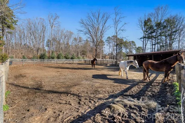 a bath tub sitting in a bathroom next to a window