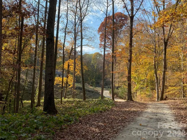 a living room with furniture fireplace and a flat screen tv