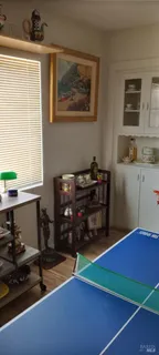 a bed room with a bed and a window