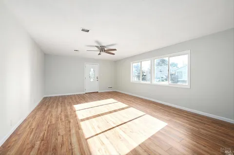 a view of an empty room and window