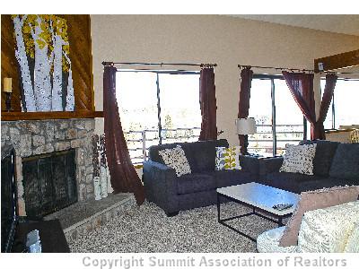9876 Ryan Gulch Road, Unit 303F Silverthorne, CO 80498 - Photo 7 of 22 Living Room.