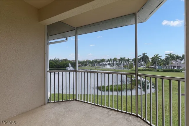 an aerial view of water body with boats and residential houses with outdoor space
