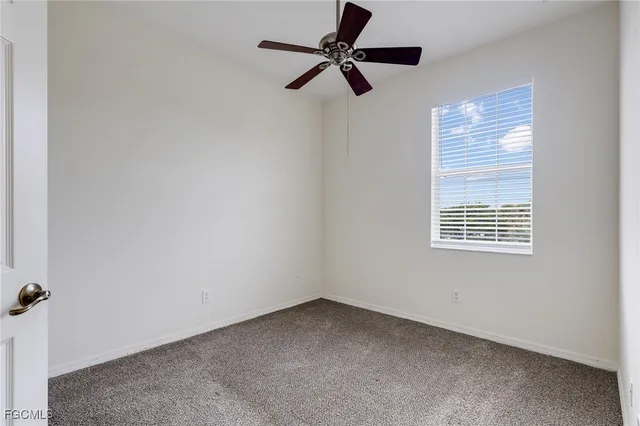 an aerial view of a house with outdoor space