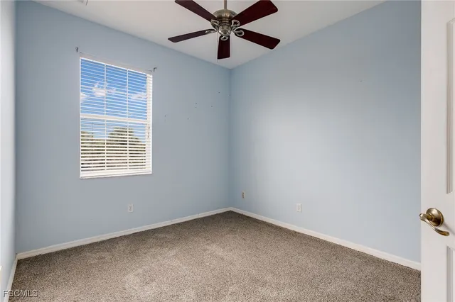 an aerial view of a house with outdoor space