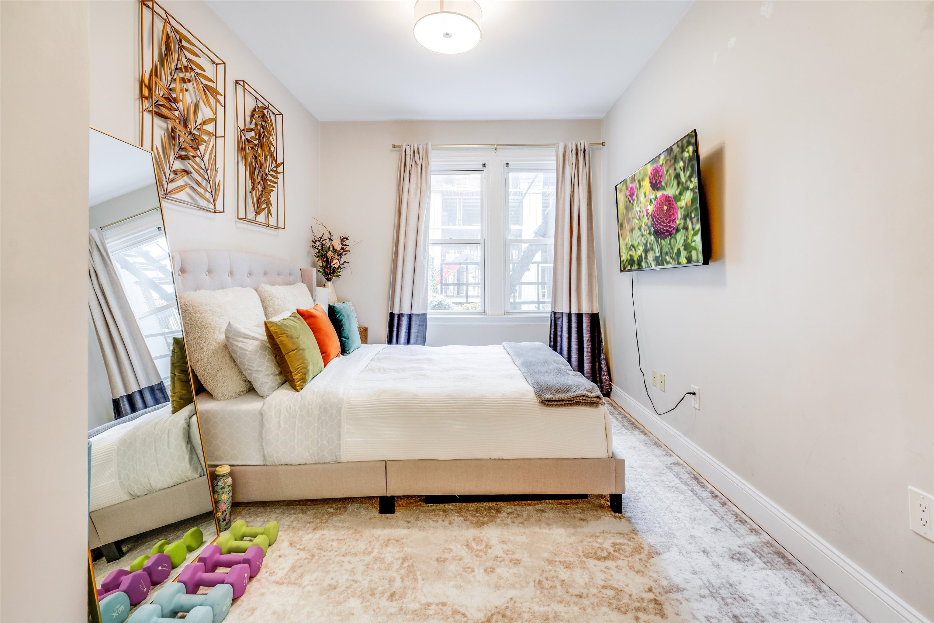 709 Monroe Street, Unit 2 Hoboken, NJ 07030 - Photo 12 of 22 a bedroom with a bed and a window