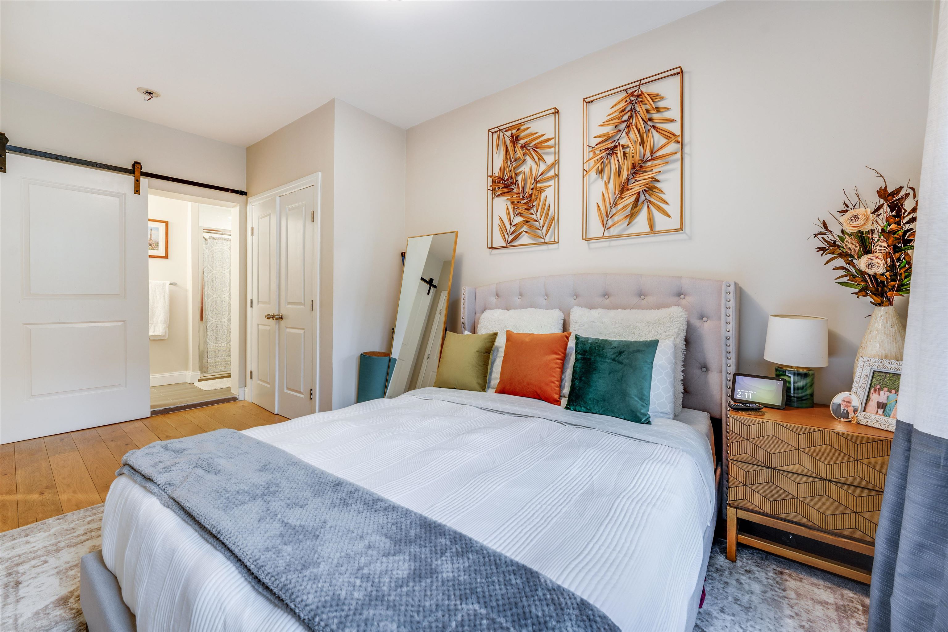 709 Monroe Street, Unit 2 Hoboken, NJ 07030 - Photo 13 of 22 a bedroom with a bed and a dresser