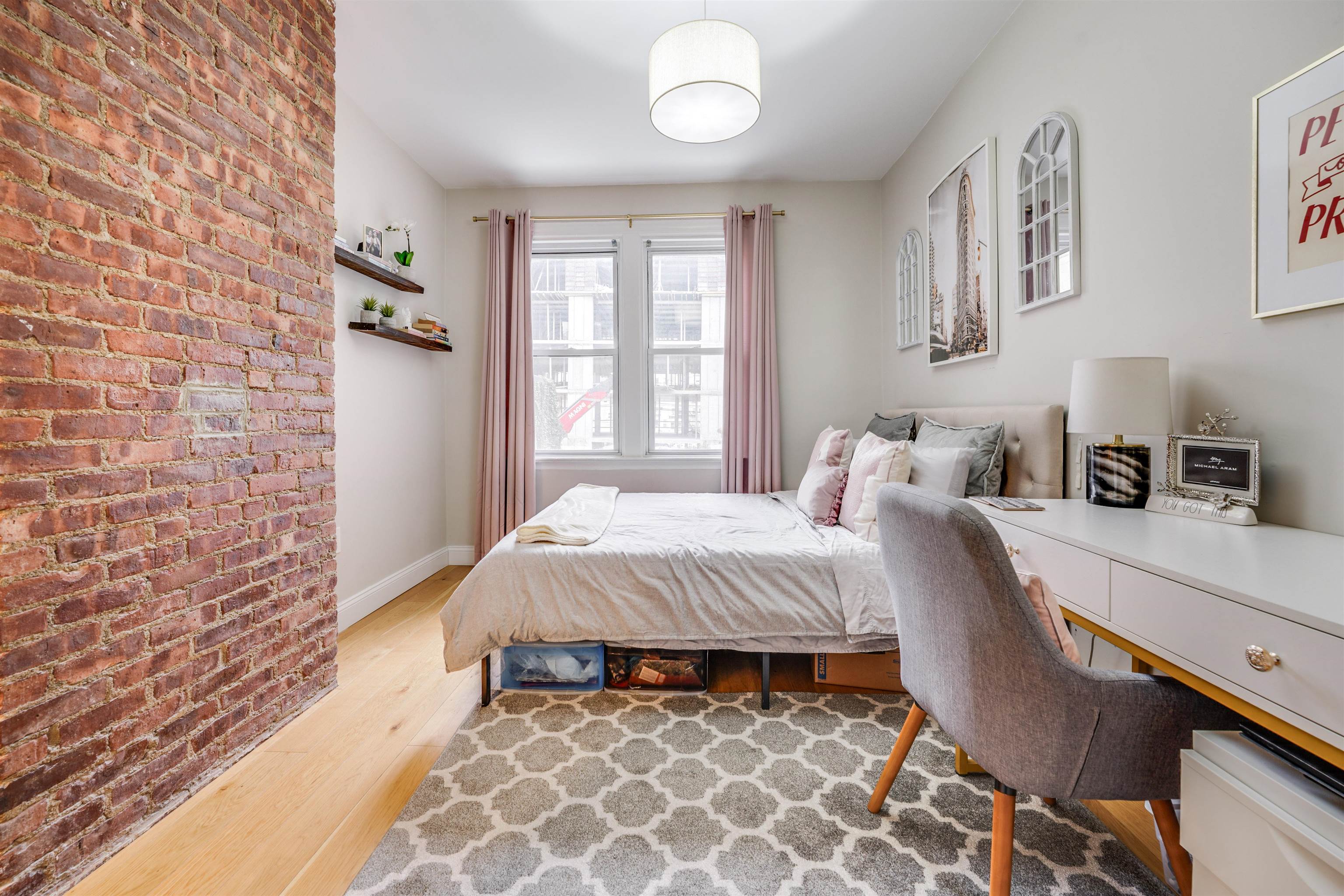 709 Monroe Street, Unit 2 Hoboken, NJ 07030 - Photo 14 of 22 a bedroom with a bed and a window