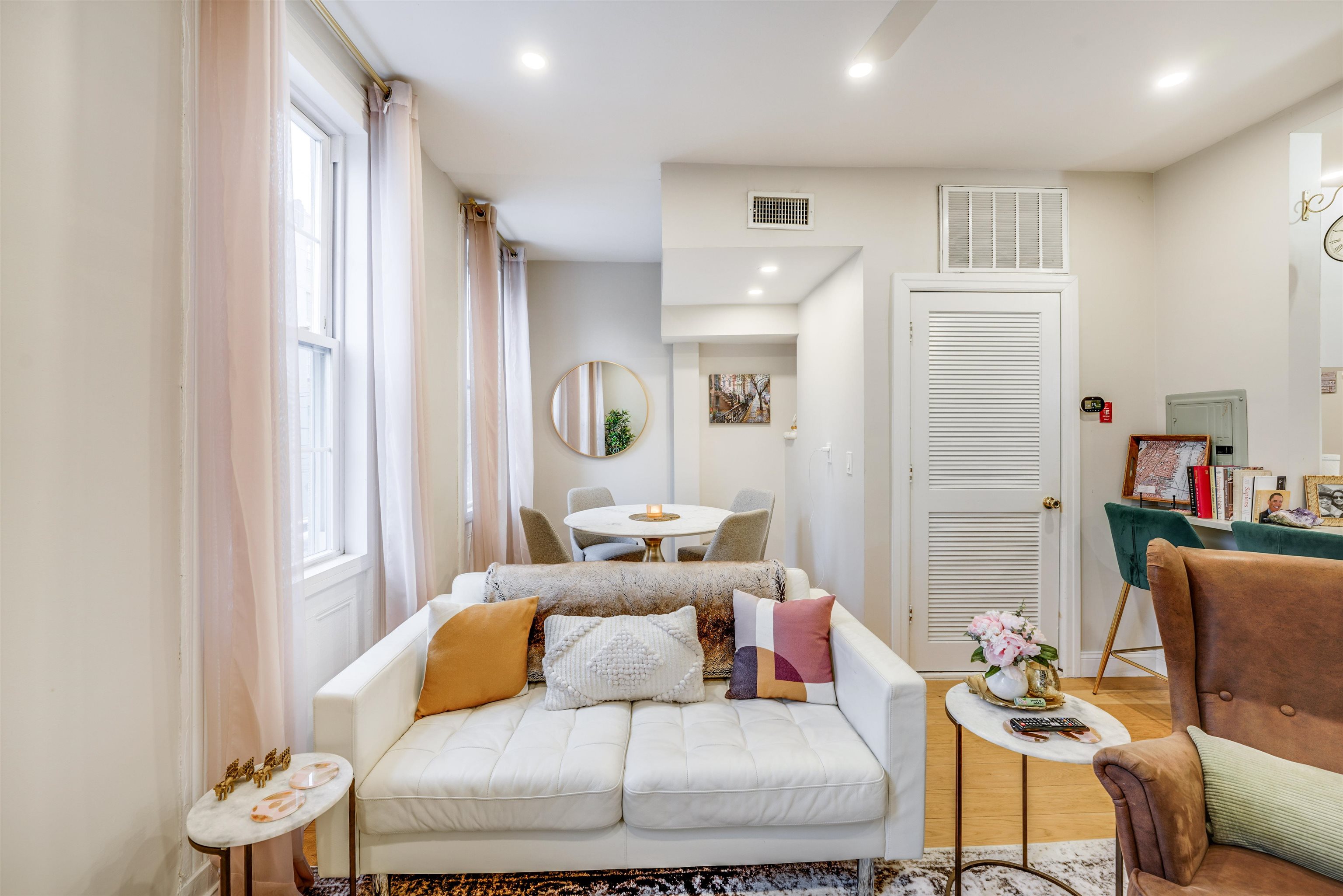 709 Monroe Street, Unit 2 Hoboken, NJ 07030 - Photo 17 of 22 a living room with furniture and a wooden floor