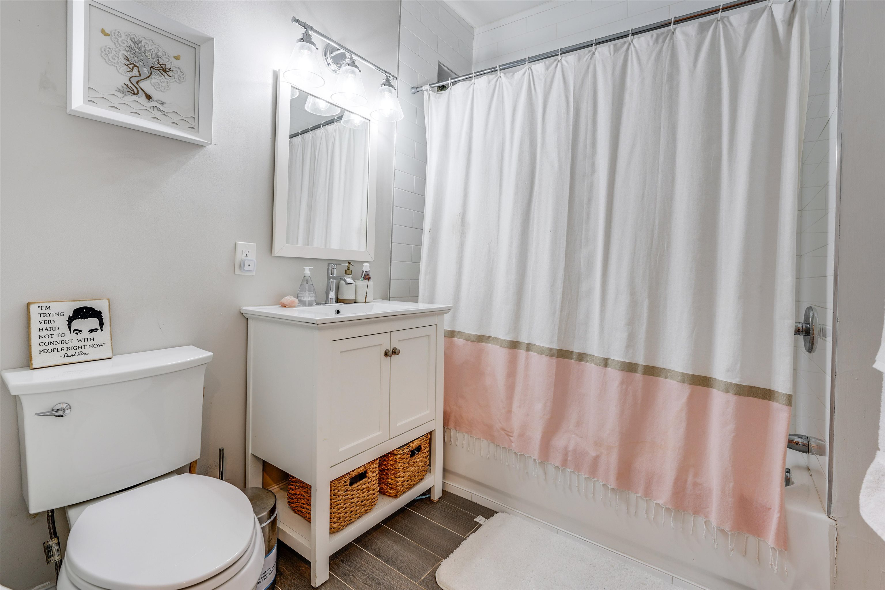 709 Monroe Street, Unit 2 Hoboken, NJ 07030 - Photo 20 of 22 a bathroom with a sink toilet and shower