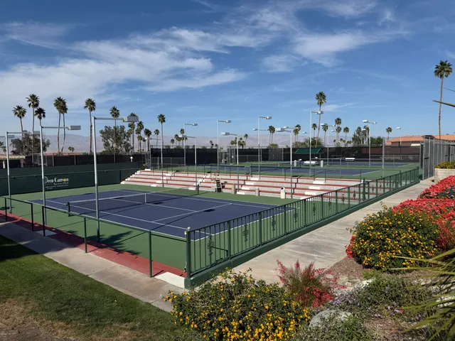 a view of swimming pool with outdoor seating