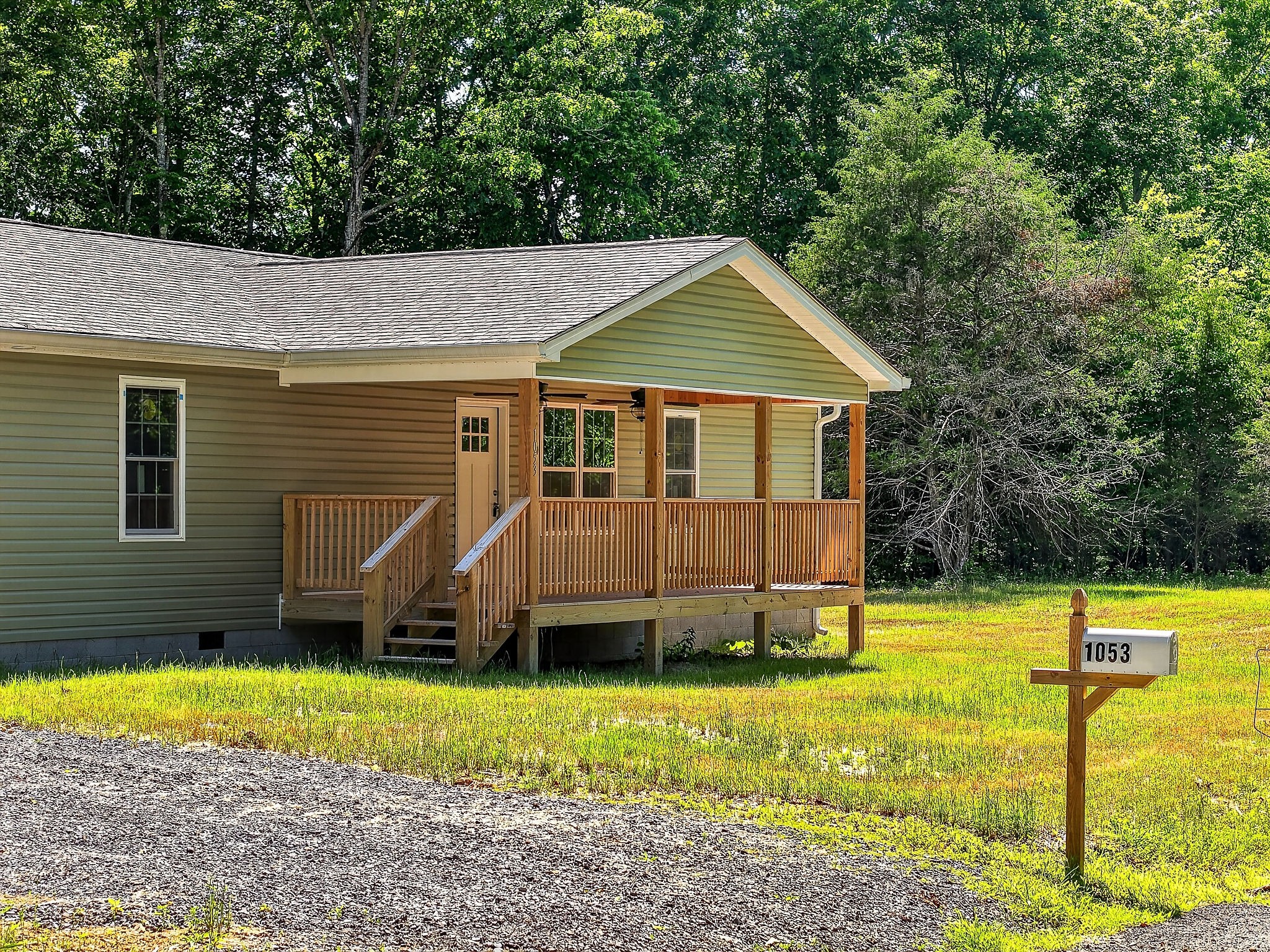 1053 Benton Tidwell Road Hilham, TN 38568 - Photo 32 of 39 a view of a house with a backyard and swimming pool
