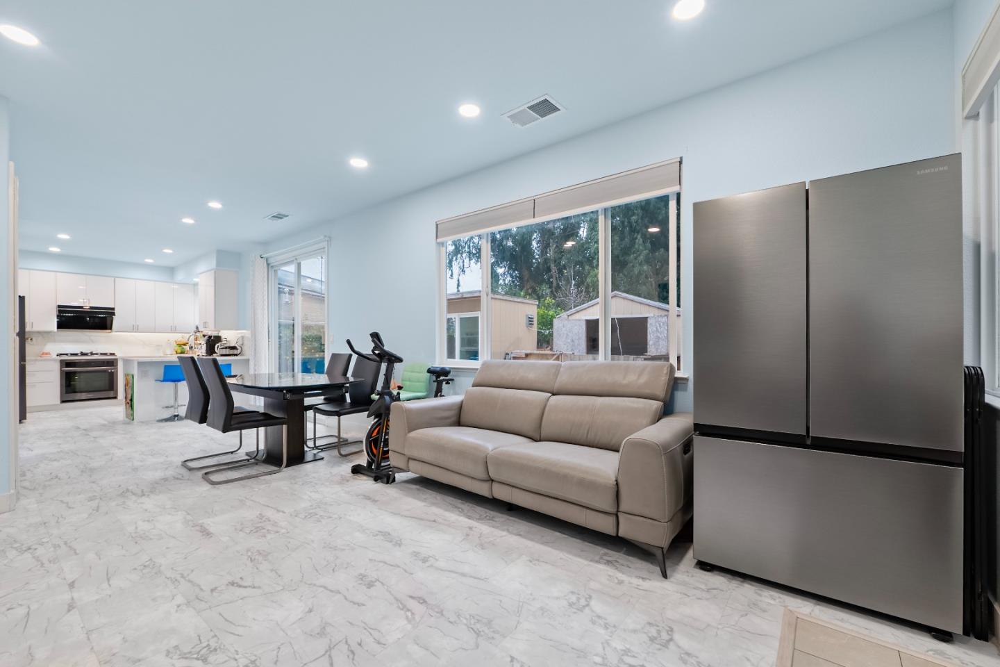 708 Raineer Court San Leandro, CA 94577 - Photo 11 of 32 a living room with furniture and a large window