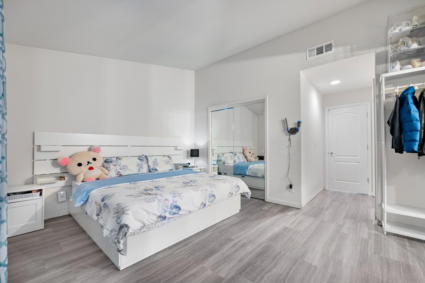 708 Raineer Court San Leandro, CA 94577 - Photo 21 of 32 a bedroom with a bed and a closet