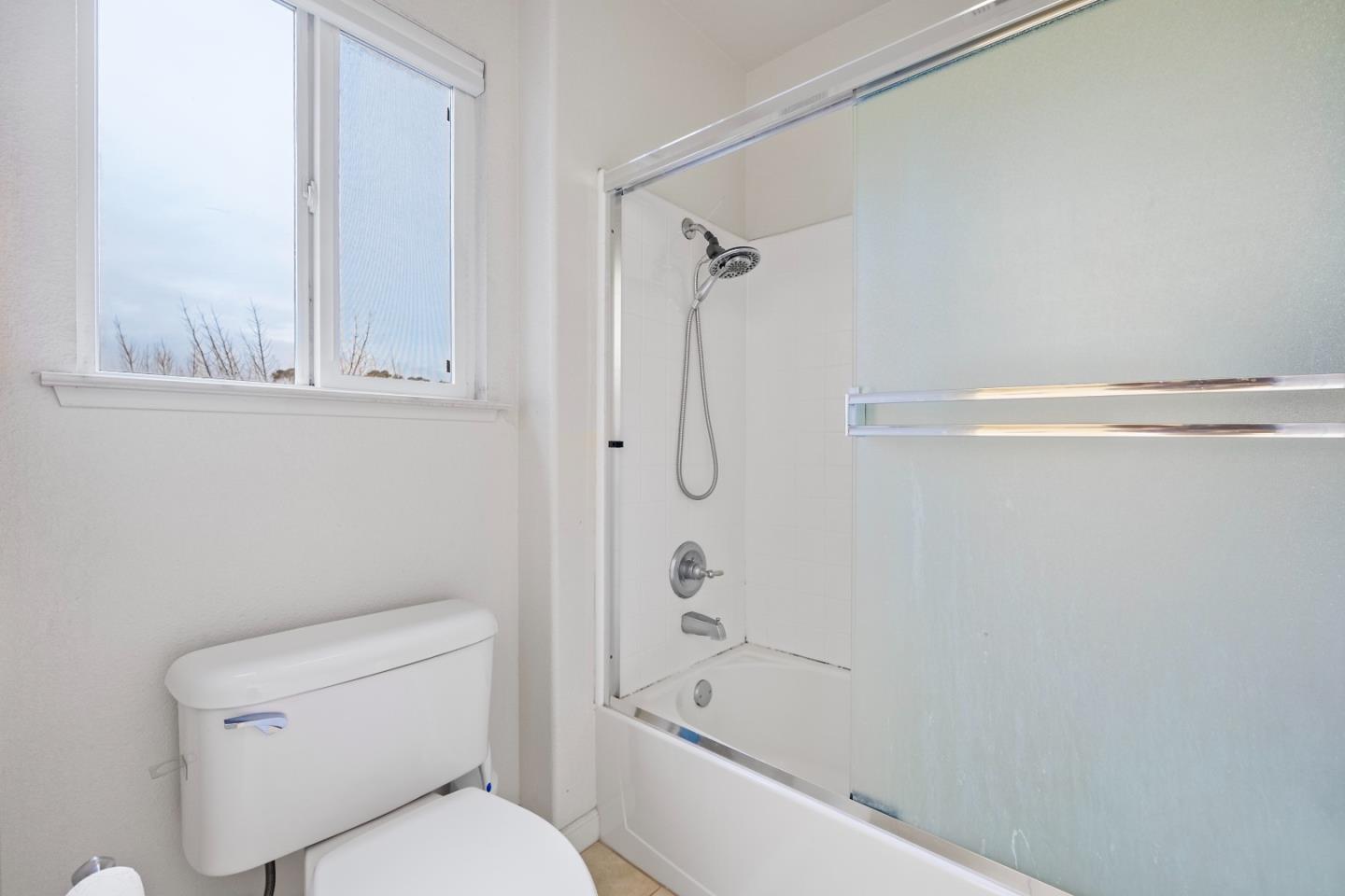 708 Raineer Court San Leandro, CA 94577 - Photo 23 of 32 a bathroom with a toilet and shower