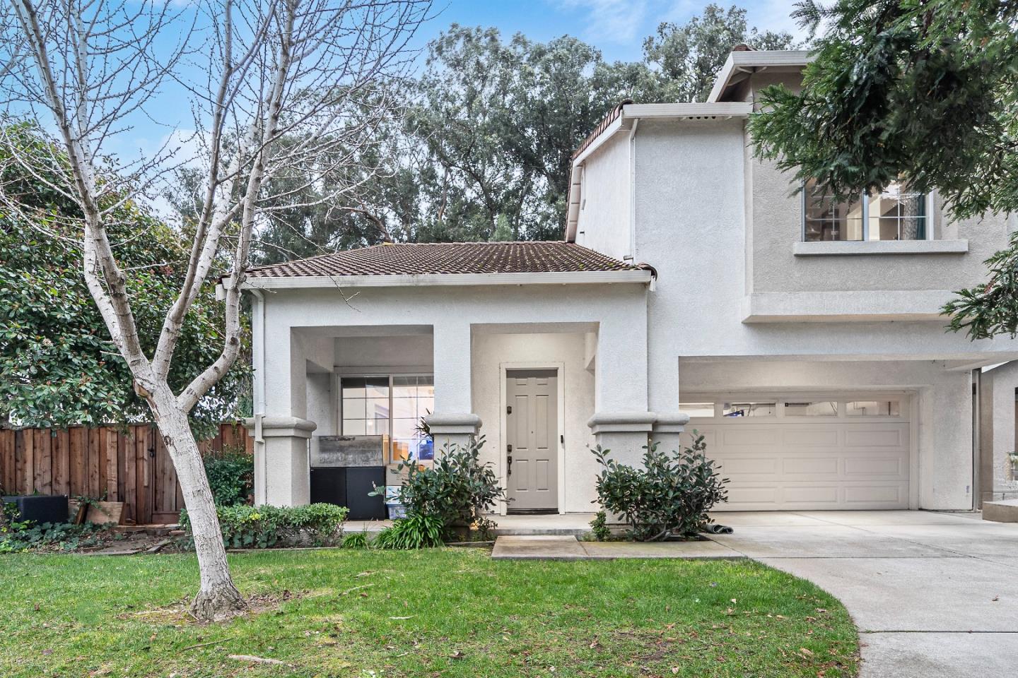 708 Raineer Court San Leandro, CA 94577 - Photo 28 of 32 a front view of a house with a yard and trees