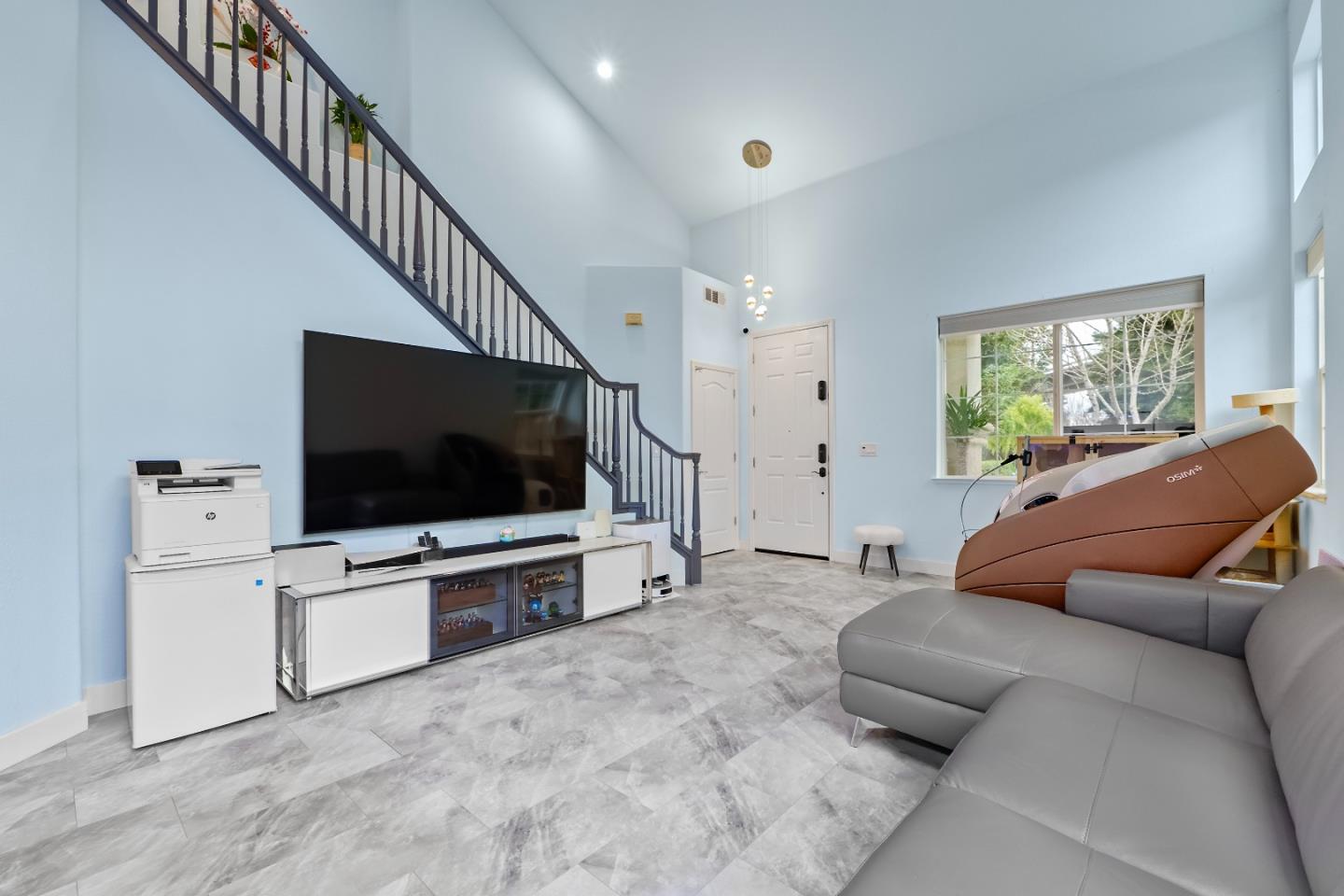708 Raineer Court San Leandro, CA 94577 - Photo 3 of 32 a living room with furniture and a flat screen tv