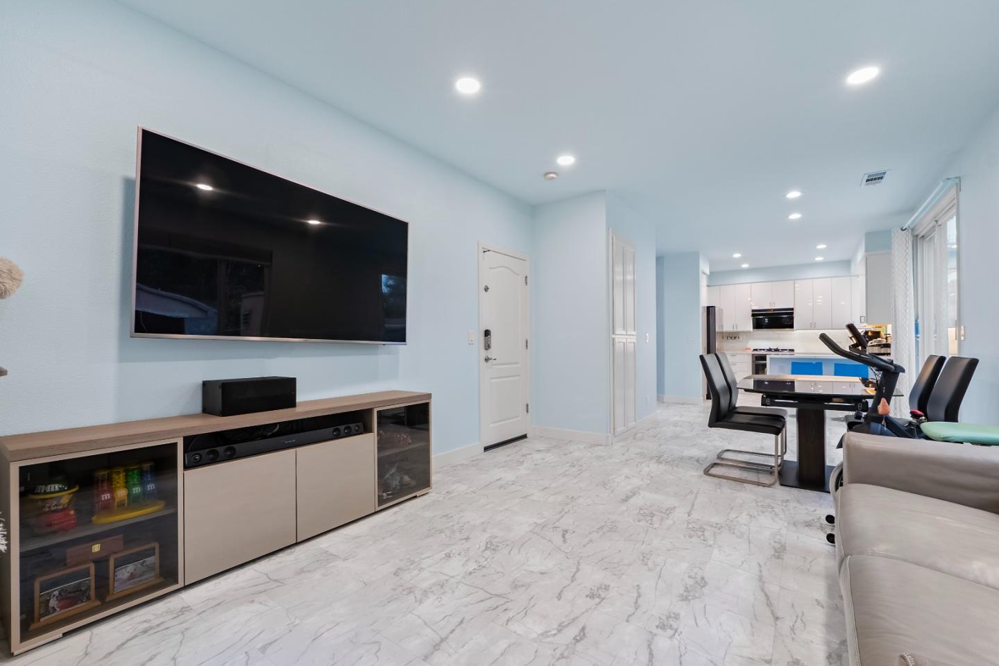 708 Raineer Court San Leandro, CA 94577 - Photo 10 of 32 a view of a kitchen with furniture and flat screen tv