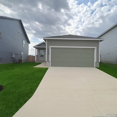 a front view of house with yard