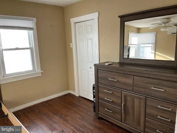 a bathroom with a toilet and a sink